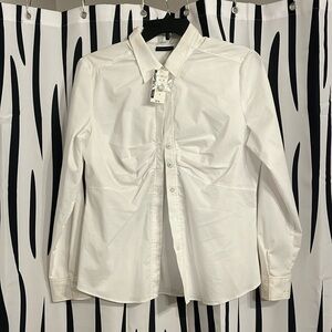 NWT white button up shirt. Material has a stretch